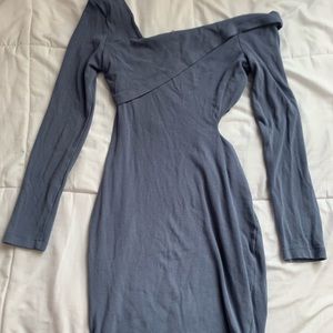 White Fox tight dark blue dress. Slit on the rib cage.